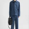 Pantaloni affusolati in chambray di cotone